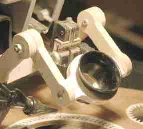 saw with 5x loupe